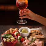 ﻿Italian appetizer with tavola and beverages at Pizzart